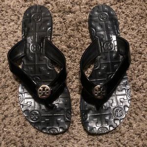 Black patent leather Tory Burch flip flops